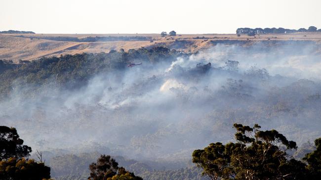 An out-of-control grassfire burning near Bacchus Marsh forced residents from their homes on Friday afternoon. Picture: Mark Stewart.