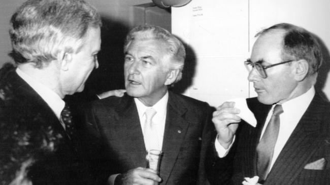 Former Liberal party leader Andrew Peacock with then Prime Minister Bob Hawke and future Prime Minister John Howard. Picture: Alan Porritt