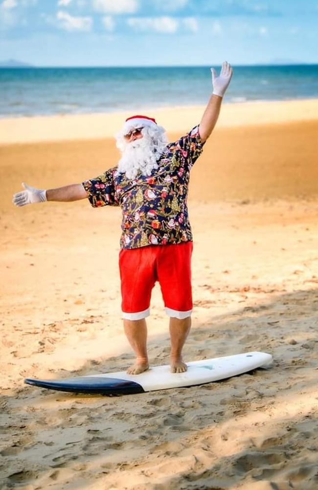 Mr Poppa’s Balloons as surfing Santa: Shoal Point 2023 - Mackay. Photographed by Jen Porter Photography and sent in by Carlie Michelle.
