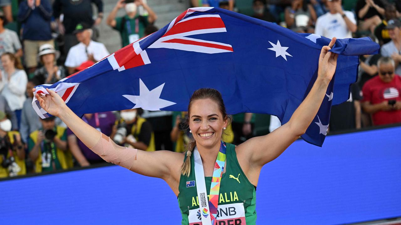 Australia's Kelsey-Lee Barber celebrates with her medal after winning the women's javelin throw final during the World Athletics Championships at Hayward Field in Eugene, Oregon on July 22, 2022. (Photo by ANDREJ ISAKOVIC / AFP)