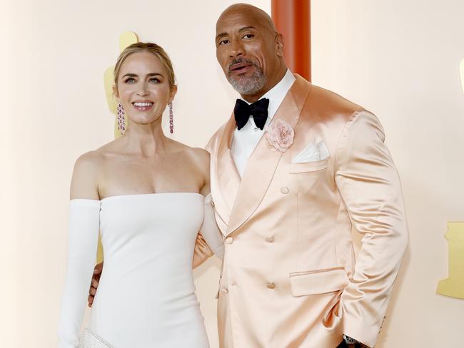 Emily Blunt co-stars with Johnson as Kerr’s wife, Dawn Staples. Picture: Mike Coppola/Getty Images