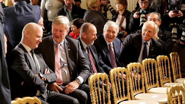 Australian business chiefs including CBA boss Ian Narev, Qantas chairman Leigh Clifford, Seven West Media chairman Kerry Stokes and Australian golf legend Greg Norman watch Turnbull and Trump’s press conference in the East Room yesterday. Picture: Nathan Edwards