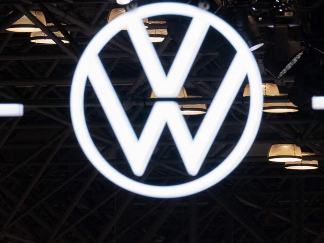NEW YORK, NEW YORK - APRIL 16: Volkswagen, Toyota and Honda logos hang at the New York International Auto Show on April 16, 2025 in New York City. The New York International Auto Show is celebrating its 125th year anniversary, amidst the background of tariffs on the automotive industry. President Donald Trump indicated the possibility of a temporary suspension of the tariffs.   Adam Gray/Getty Images/AFP (Photo by Adam Gray / GETTY IMAGES NORTH AMERICA / Getty Images via AFP)
