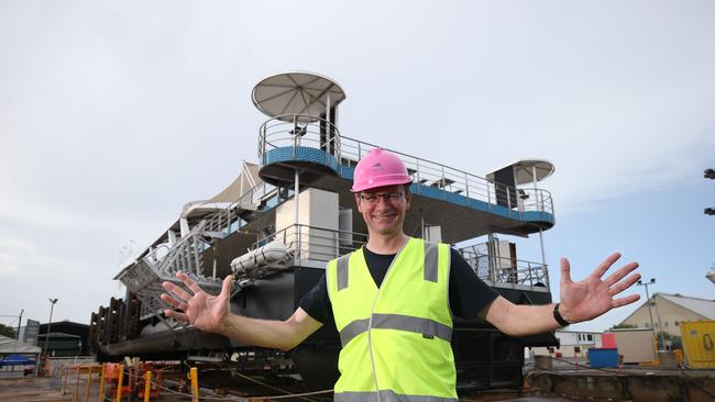 Experience Co CEO John O’Sullivan is dwarfed by the 1,000sq m adventure pontoon. Picture: Brendan Radke