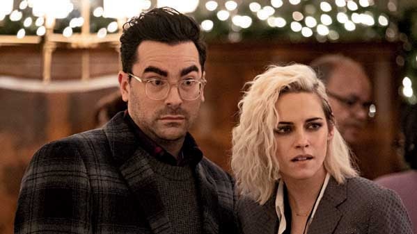 Schitt’s Creek star Dan Levy appears alongside Stewart in Happiest Season