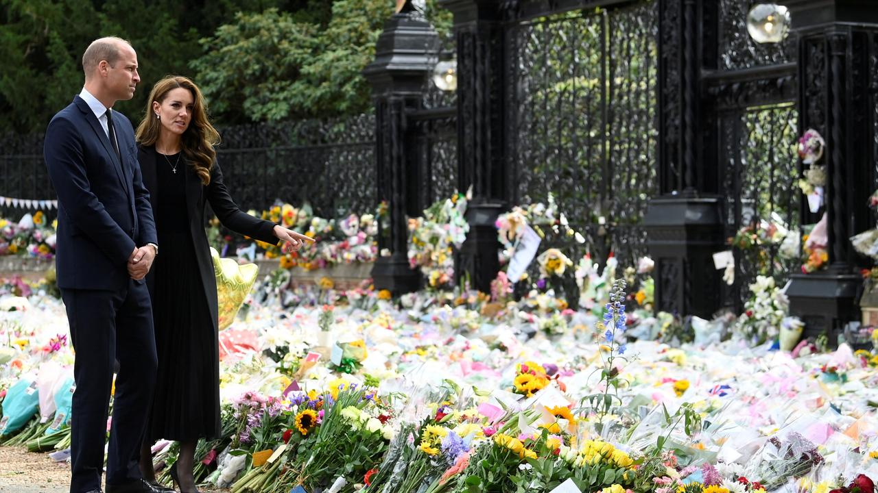 William and Kate view the floral tributes left at Sandringham. Picture: Toby Melville – WPA Pool/Getty Images