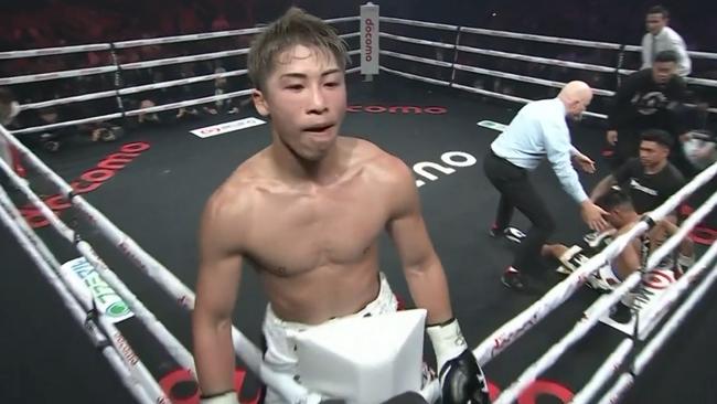 Inoue celebrates on the ropes after sending Tapales to the canvas.