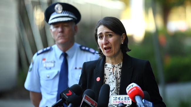 NSW Premier Gladys Berejiklian (right) and NSW Police Commissioner Mick Fuller addressing the media following the announcement of further police powers.