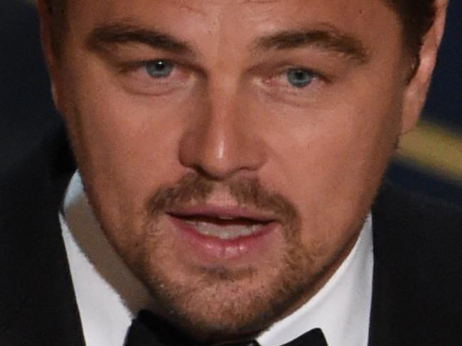 Actor Leonardo DiCaprio accepts the award for Best Actor in,The Revenant on stage at the 88th Oscars on February 28, 2016 in Hollywood, California. AFP PHOTO / MARK RALSTON