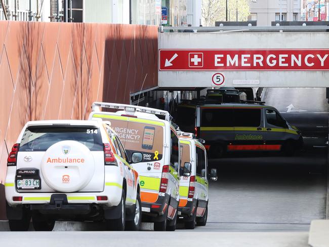TEAMWORK REQUIRED: Ambulances wait at the Royal Hobart Hospital. Picture: Luke Bowden
