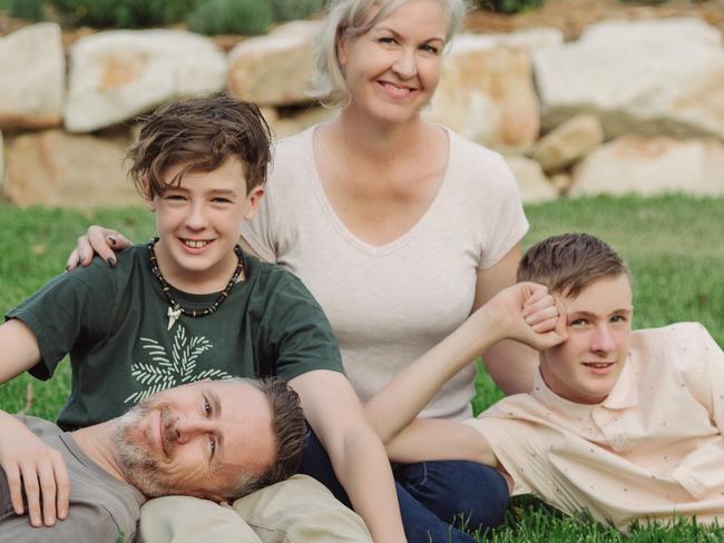 Jody Allen - The stay At Home Mum has published a new book - pictured here at home with her family: son in black t shirt: Flynn, 12 , Jody Allen, son in white polo shirt, Nate, 13 and husband Brendan Allen Picture: Jody Allen