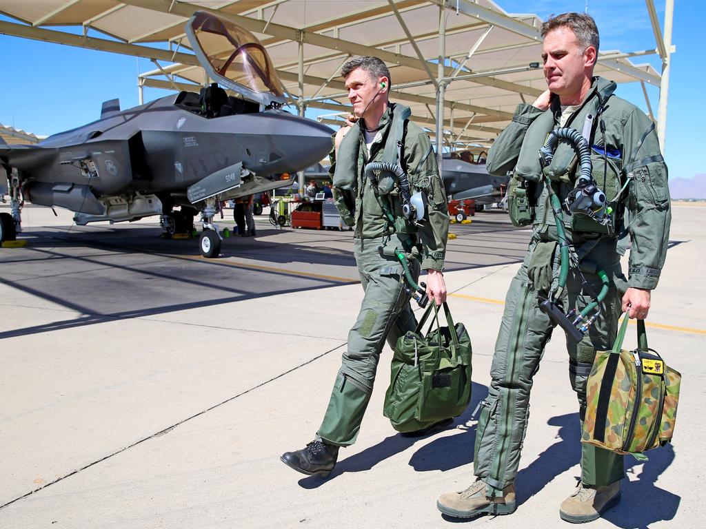 Australian Pilots training in the F35 fighter Jets Luke Airforce Base in Phoenix Arizona. Squadron leader Wing Commander Darren Clare (R) and Squadron Leader on the flight line before a flight. Picture: Nathan Edwards