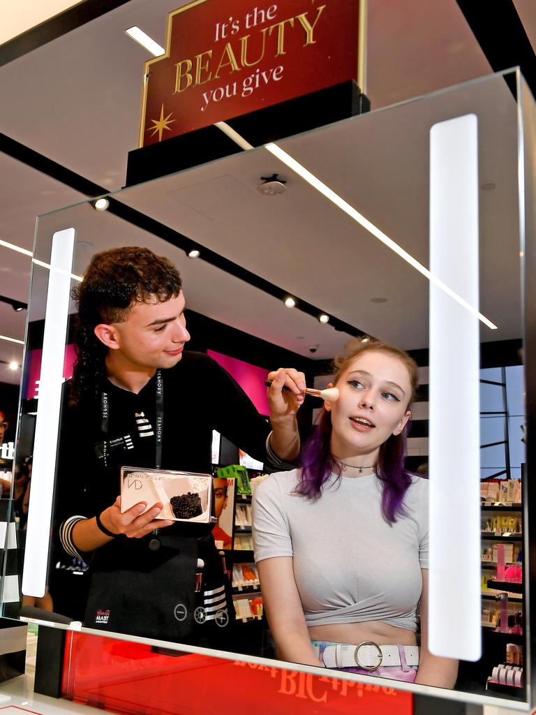 Laura Liefting gets her makeup done by Nathan Breheny at the opening of Sephora Indooroopilly. Picture: John Gass