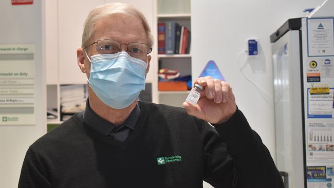 TerryWhite Chemmart Ipswich owner and pharmacist Bob Slater with a vial of the Moderna vaccine. Picture: Lachlan McIvor