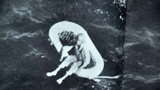 Sole survivor Terry Jo Duperrault, 11, badly sunburnt, dehydrated and surrounded by curious sharks on a life raft in the Bahamas in 1961 after the massacre.