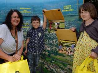 LEARNING EARLY: Amelia White with her children Chester Eliott, 4, and Cleopatra Eliott, 7, learning about recycling at the Litter-Free Lunch. Picture: Mireille Merlet-Shaw