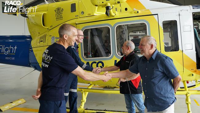 Pilot Andrew Caton, Aircrew Officer Dan King, yacht owner Brian Mateer and Alan “Scotty” Freemantle reunite after the dramatic rescue of the two ex-Navy boaties from their vessel when it was struck by a rogue wave near Fraser Island.