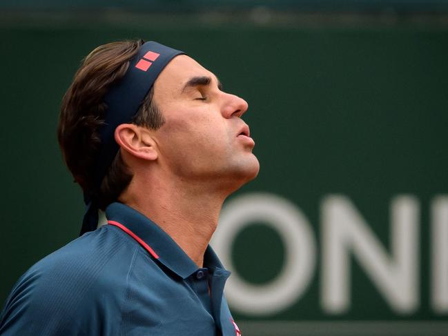 Switzerland's Roger Federer reacts during his ATP 250 Geneva Open tennis match against Spain's Pablo Andujar on May 18, 2021 in Geneva. (Photo by Fabrice COFFRINI / AFP)