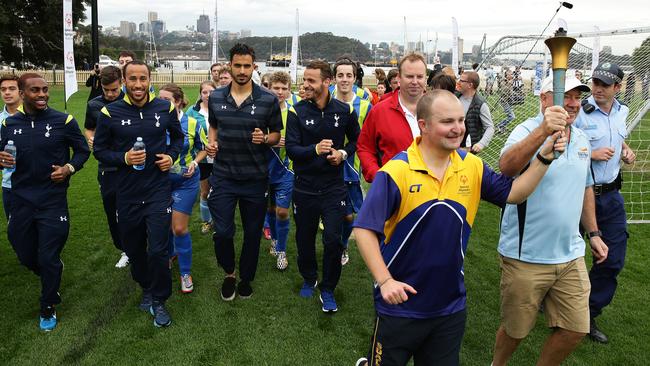 Danny Rose, Harry Winks, Andros Townsend, Nacer Chadli and Roberto Soldado took part in a Special Olympics coaching clinic at Birchgrove Oval, Sydney. Pic Brett Costello