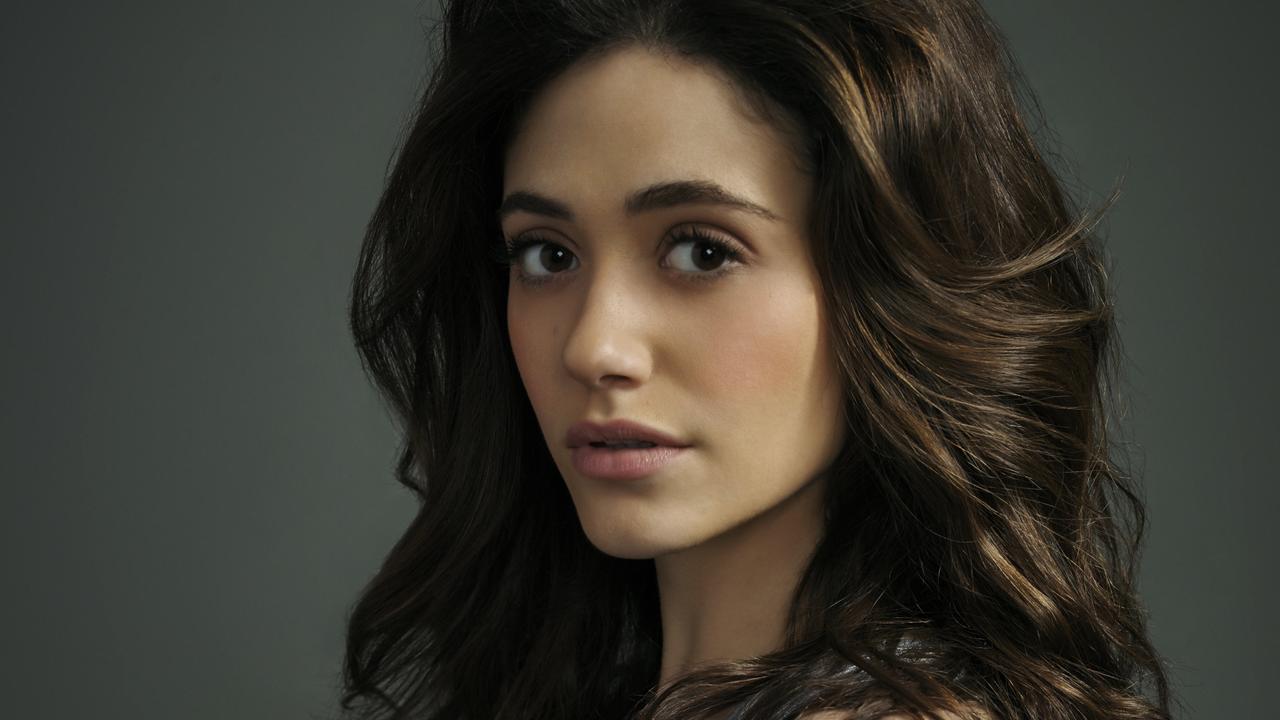 Emmy Rossum, now well-versed on the use of a ‘vag pad.’