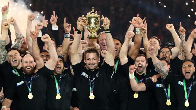 Richie McCaw of New Zealand lifts the Webb Ellis Cup.