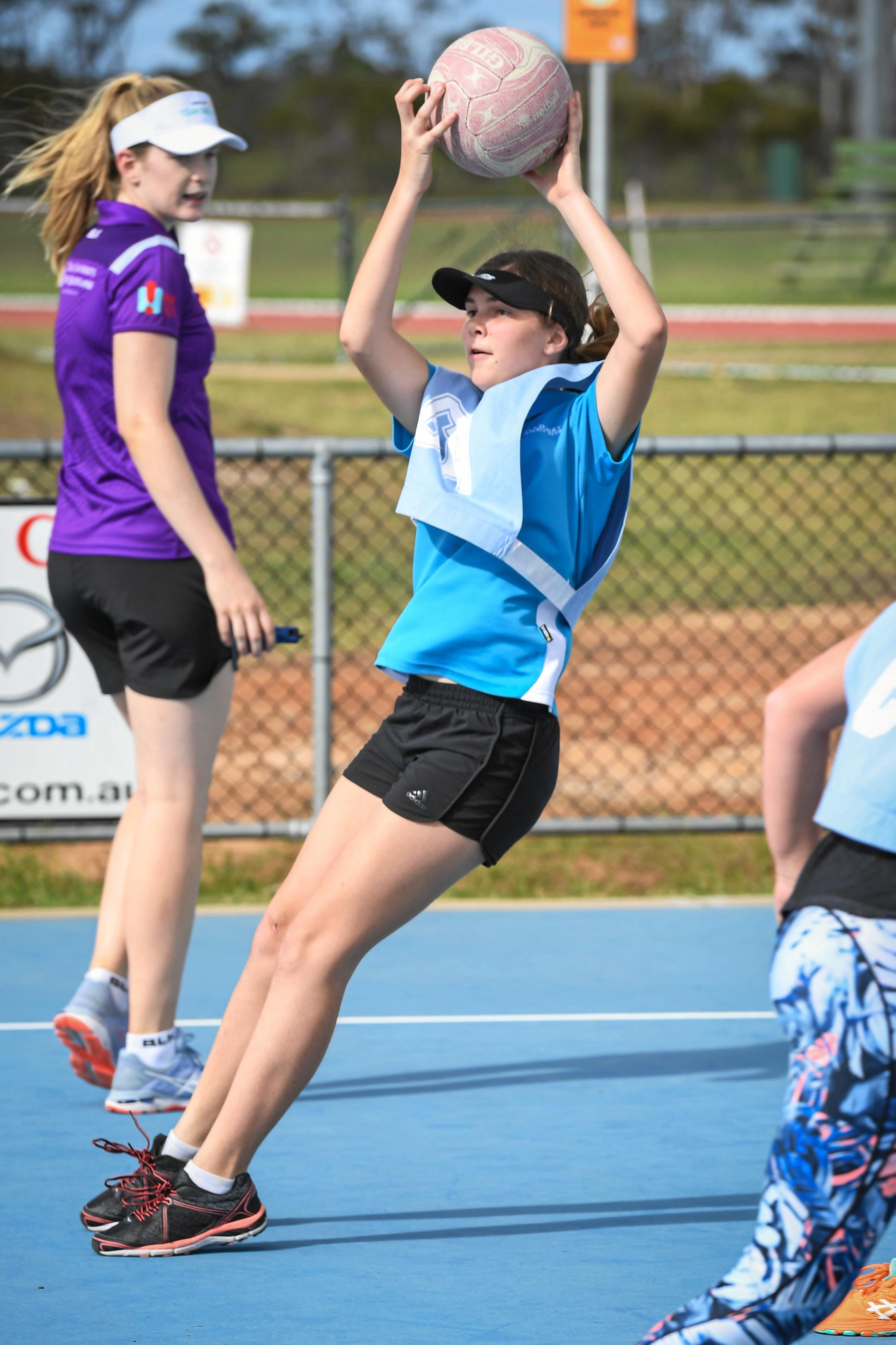 Lucy Walters played as Goal Attack at the Firebirds Netball Clinic. Picture: Brian Cassidy