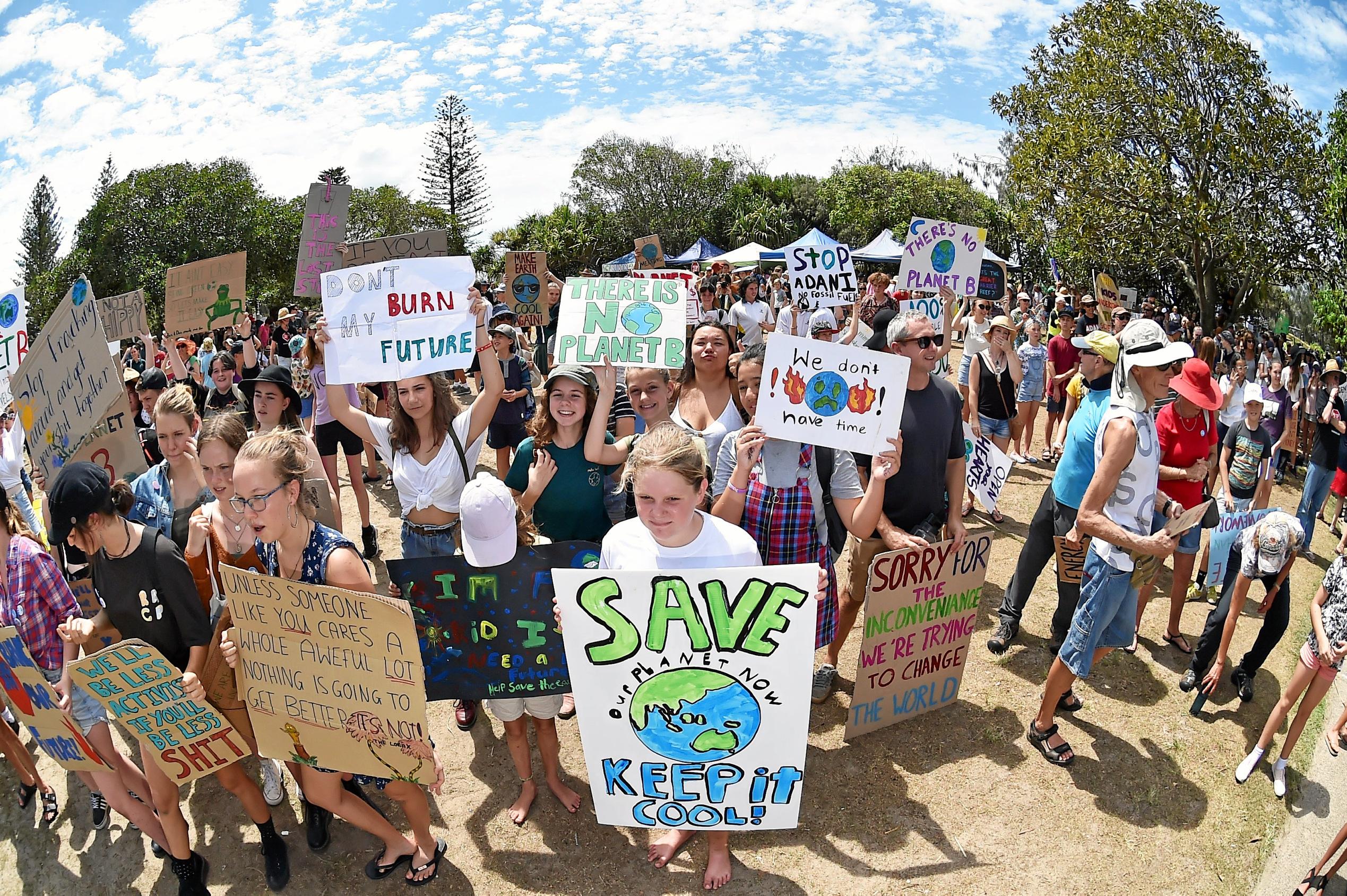 School students and community members gather at Peregain Beach to tell our politicians to take all them seriously and start treating climate change for what it is: a crisis and the biggest threat to our generation and gererations to come. Picture: Patrick Woods