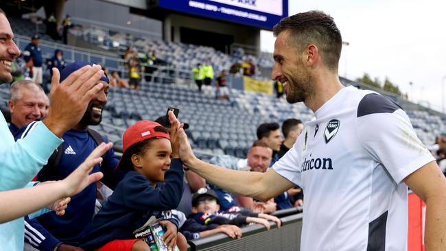 Matthew Spiranovic, seen here greeting fans in Geelong, has retired. Picture: Jonathan DiMaggio/Getty Images