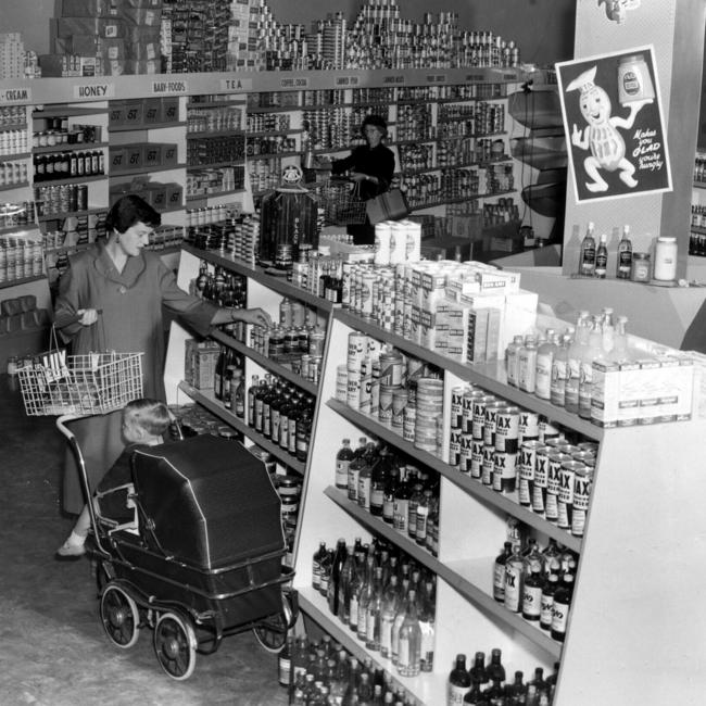 A oman shopping in an Unley supermarket in 1957.