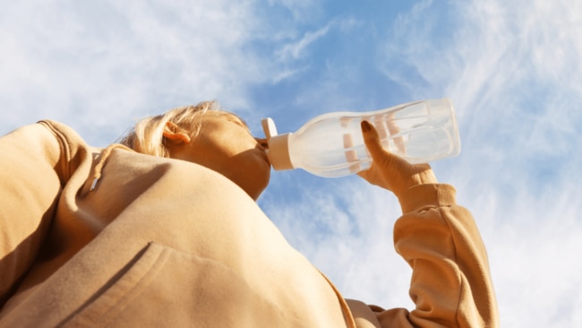 The recommended fluid intake for women is 2.1 litres, or about eight cups a day. Image: Getty