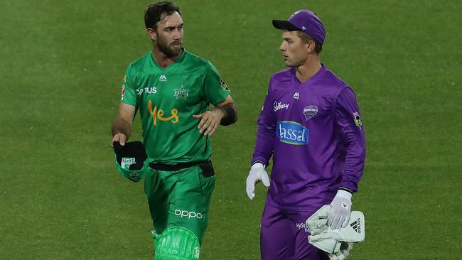 Captains Glenn Maxwell and Ben McDermott chat after the Stars-Hurricanes match was called off.