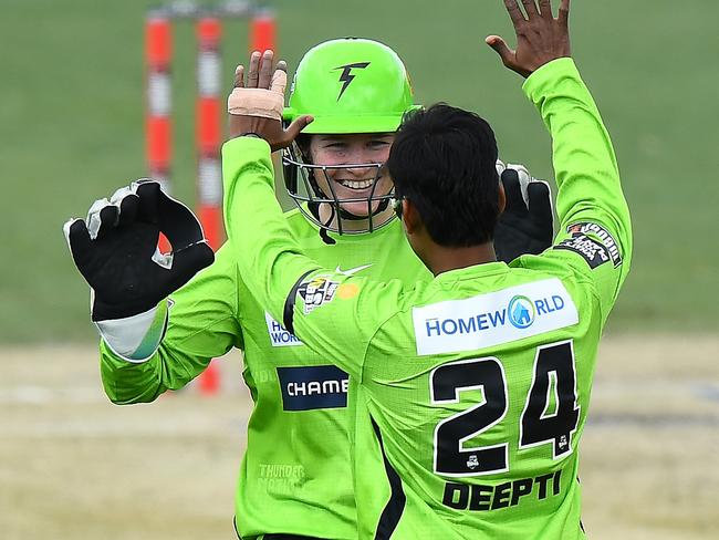 LAUNCESTON, AUSTRALIA - OCTOBER 31: Tahlia Wilson and Deepti Sharma of the Thunder celebrate the wicket of Mignon du Preez of the Hurricanes during the Women's Big Bash League match between the Sydney Thunder and the Hobart Hurricanes at University of Tasmania Stadium, on October 31, 2021, in Launceston, Australia. (Photo by Steve Bell/Getty Images)