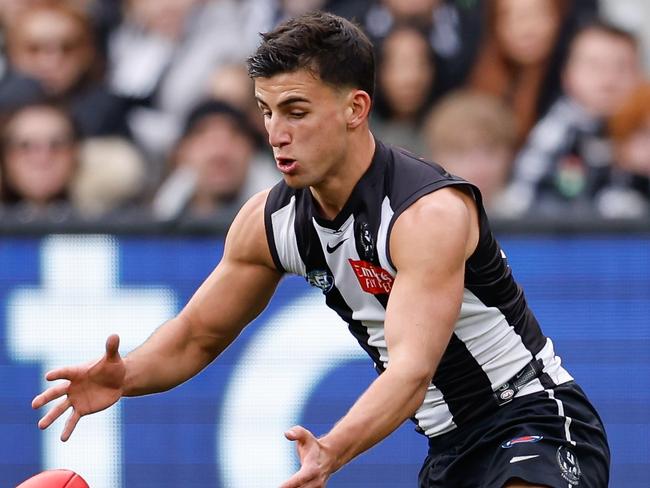 MELBOURNE, AUSTRALIA - JULY 28: Nick Daicos of the Magpies in action during the 2024 AFL Round 20 match between the Collingwood Magpies and the Richmond Tigers at the Melbourne Cricket Ground on July 28, 2024 in Melbourne, Australia. (Photo by Dylan Burns/AFL Photos via Getty Images)