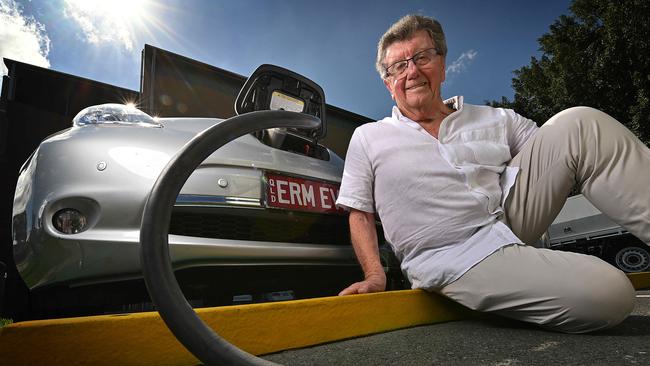 Energy billionaire Trevor St Baker recharges his 4 year old Nissan Leaf with one of his companies made charging stations near his home in St Lucia, Brisbane.