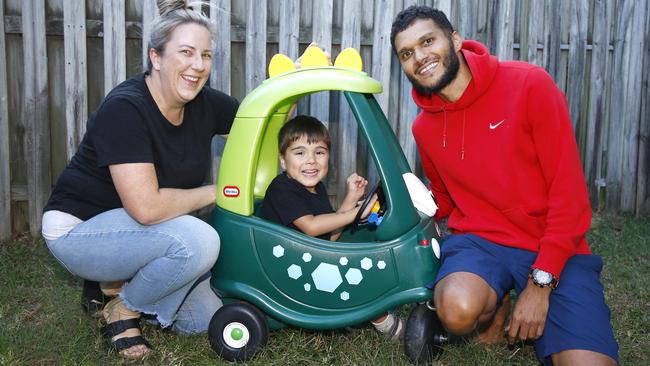 Alana Radford and Tim Scoble with their son Reef, 4, at their home in Labrador. Picture: Tertius Pickard