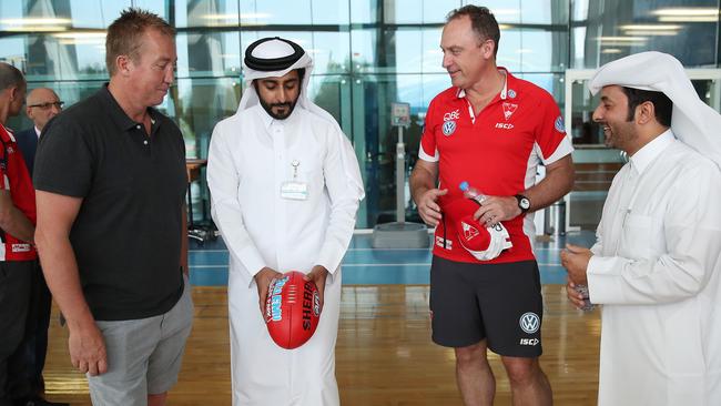 Robinson and Swans coach John Longmire at a sports medical facility in Qatar.