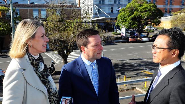 State shadow health minister Georgia Crozier, Opposition leader Matthew Guy and Bellarine candidate Donny Grigau discuss a women's and children's hospital for Geelong. Picture: Alison Wynd