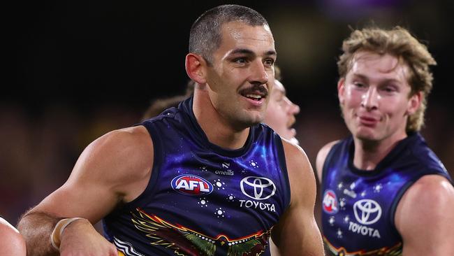 ADELAIDE, AUSTRALIA - MAY 26: Taylor Walker of the Crows celebrates a goal with team mates during the 2024 AFL Round 11 match between Kuwarna (Adelaide Crows) and Waalitj Marawar (West Coast Eagles) at Adelaide Oval on May 26, 2024 in Adelaide, Australia. (Photo by Sarah Reed/AFL Photos via Getty Images)