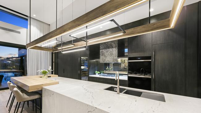 A marble kitchen is one of the home’s main features.