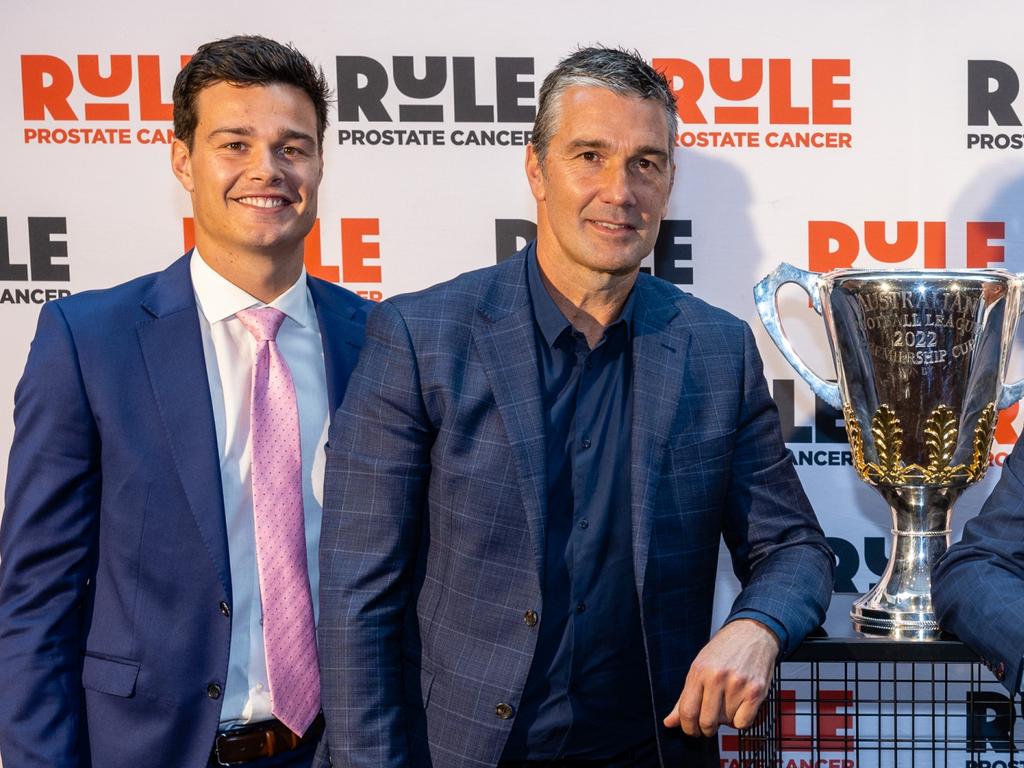 Jack and Stephen Silvagni pose with the 2022 premiership cup. Picture: Andrew Hobbs Photography