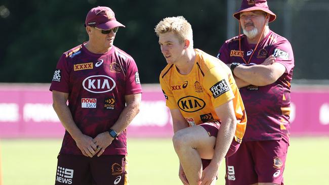 Coach Kevin Walters talking with Tom Dearden after the halfback signed with the Cowboys. Picture: Liam Kidston