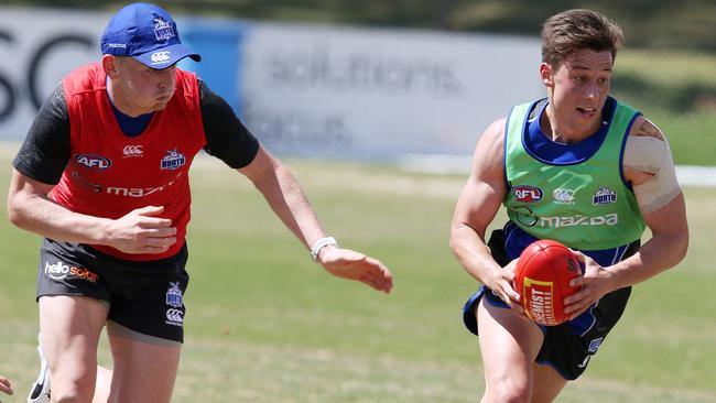 Nathan Hrovat breaks away from Jack Ziebell. Picture: Michael Klein