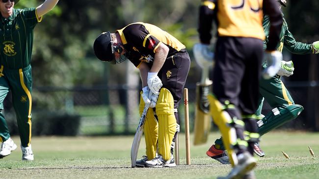 Jackson Waters has his stumps disturbed by Aaron Crispe. Picture: Steve Tanner