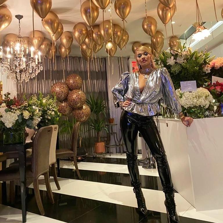 Rita Ora celebrates her birthday at home – but she later partied with 30 friends in a London restaurant.