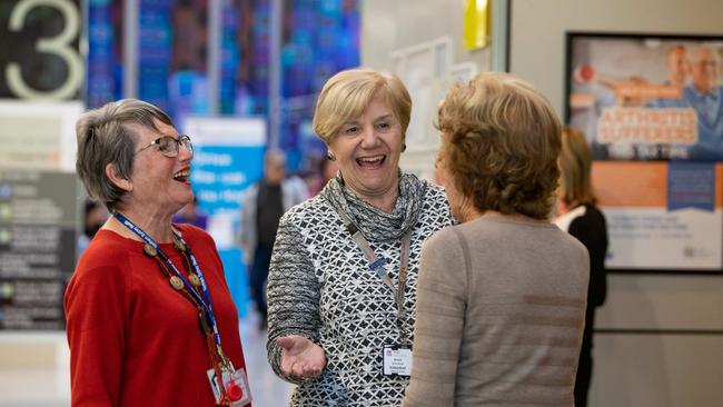 Elizabeth Schneeberger and Anne Brown greet a visitor. Image: Julian Andrews.