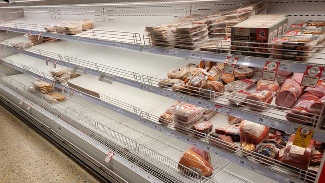 The shelves were emptied in Coles Idalia. Picture: Chris McMahon.