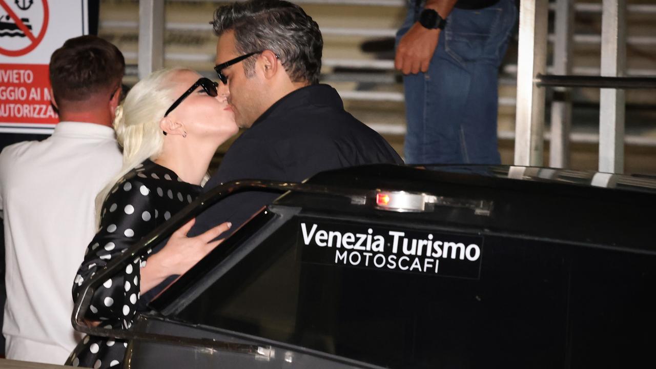 Lady Gaga and Michael Polansky share a kiss in Venice. Picture: Franco Origlia/Getty Images