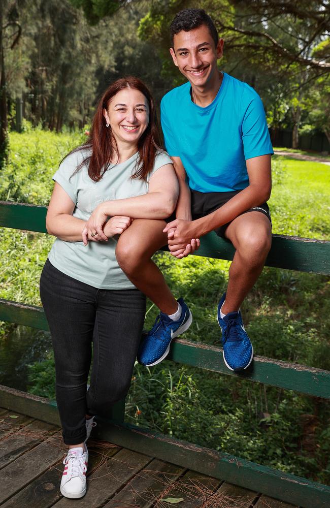 Christine Berville with her son, Luke, 14, who is heading into Year 9 at St Paul's Catholic College this year. Picture: Justin Lloyd