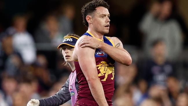 Star Lion Lachie Neale clutches at his shoulder during the Preliminary Final. Picture: Michael Willson/AFL Photos via Getty Images