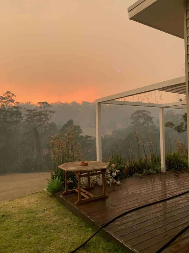 On the Constance family deck as fire raged in the area. Picture: Supplied